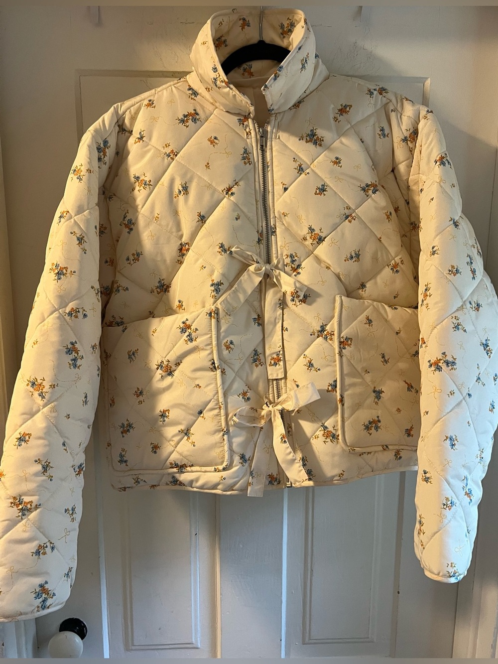 No Boundaries Cream Quilted Jacket with Floral Accent